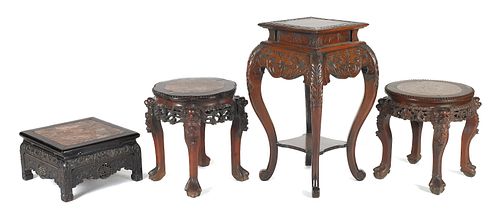 Four Chinese carved stands, early 20th c., tallest