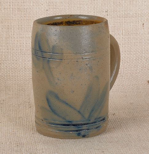 Pennsylvania stoneware mug, 19th c., attributed to