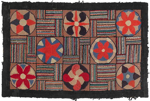 Pennsylvania hooked rug, early 20th c., with pinwh