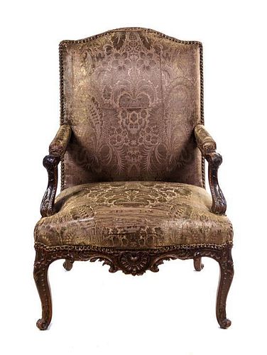 * A Regence Beechwood Fauteuil Height 42 1/2 inches.