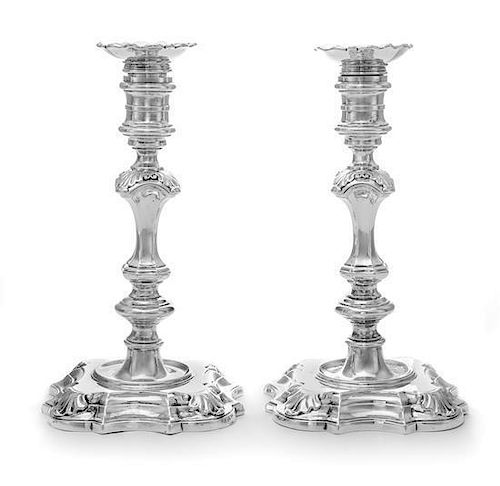 * A Pair of George II Silver Candlesticks, George Wickes, London, 1743, each having a banded candle cup surmounting a knopped
