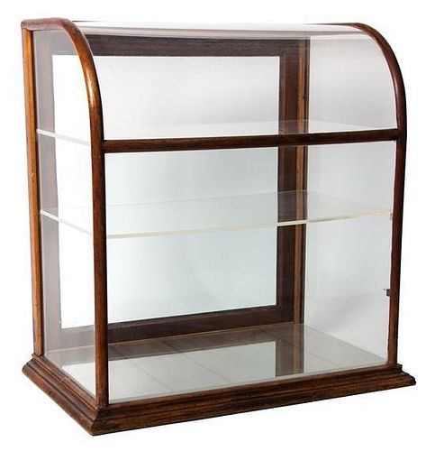 A Wood Framed Glass Display Case Height 23 3/4 x width 21 x depth 14 1/2 inches.