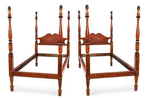 A Pair of Ebonized and Faux Burr Elm Painted Single Four-Poster Beds Height 64 x width 41 x depth 77 inches.
