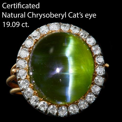 IMPORTANT CERTIFICATED CAT'S EYE AND DIAMOND CLUSTER RING