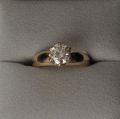 14K gold diamond ring, with a round brilliant cuta