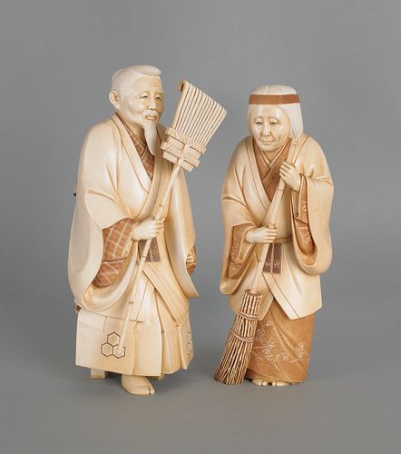 Pair of Japanese carved elephant ivory of a man an