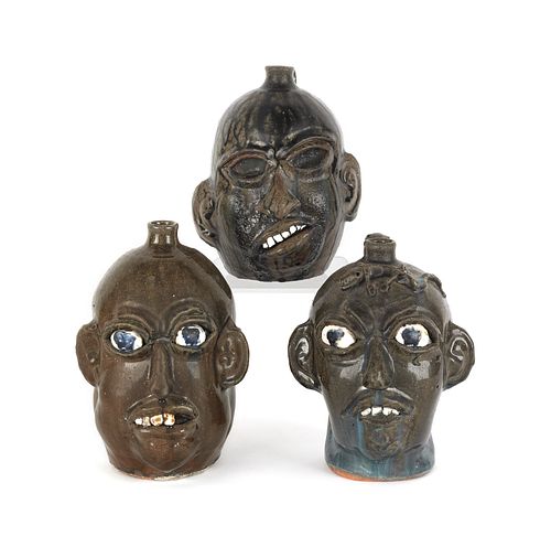 Three Georgia stoneware face jugs by Chester Hewel