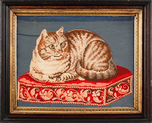 Victorian pictorial needlework of a cat resting on