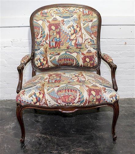 A Louis XV Style Beechwood Fauteuil Height 43 1/2 inches.