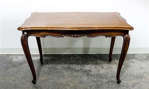 A Louis XV Style Oak Table Height 26 1/2 x width 40 1/2 x depth 21 inches.
