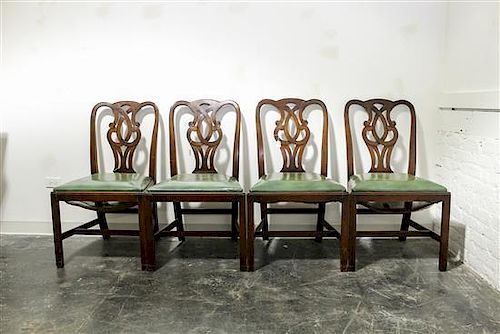 * A Set of Four Chippendale Style Mahogany Side Chairs Height 37 inches.