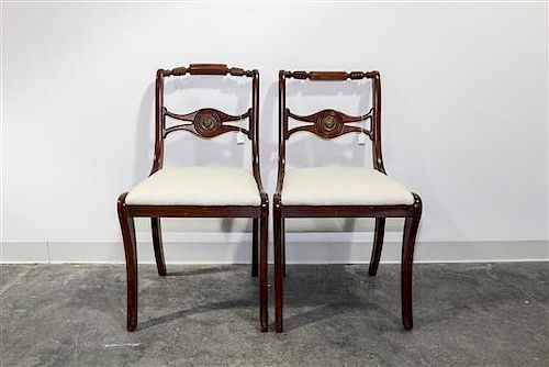 * A Pair of Regency Style Mahogany Side Chairs Height 32 inches.