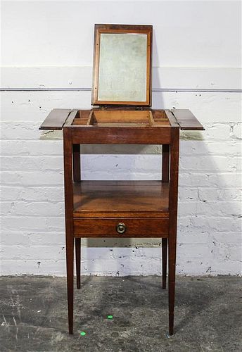 * An English Mahogany Dressing Table Height 33 x width 16 x depth 16 3/4 inches (closed).