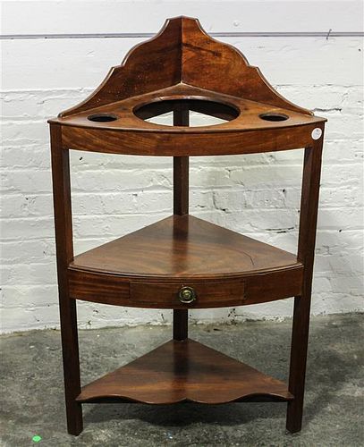 * An English Mahogany Corner Wash Stand Height 38 x width 23 1/2 x depth 15 inches.