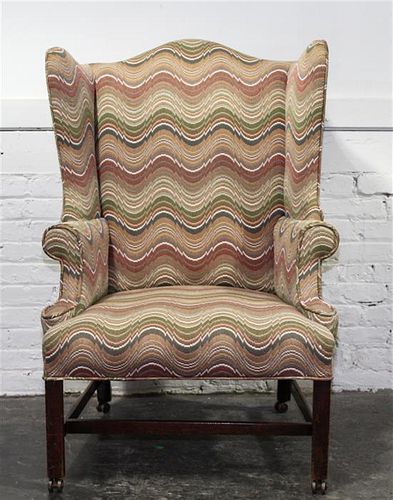 * A Georgian Style Mahogany Wingback Chair Height 44 3/4 inches.