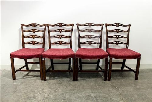 * A Set of Four Chippendale Style Mahogany Ribbon Back Side Chairs Height 37 inches.