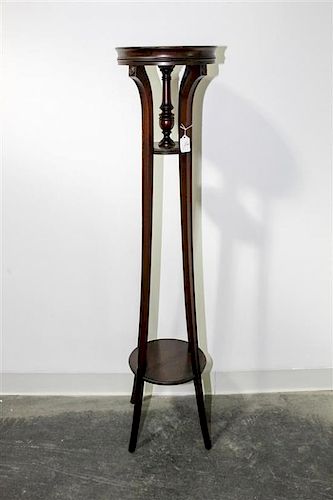 * A Regency Style Mahogany Pedestal Height 48 x diameter 10 3/4 inches.