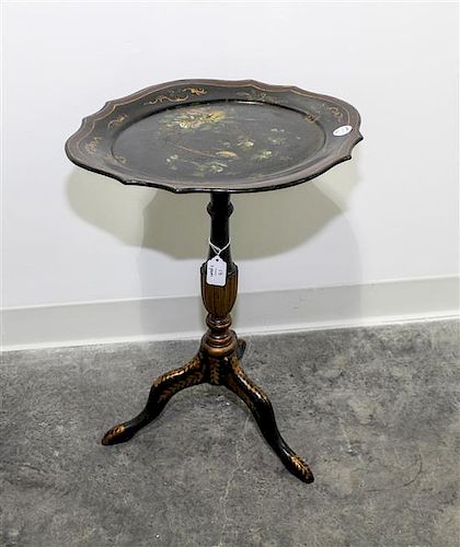 * A Victorian Lacquered Tripod Table Height 22 x width 16 x depth 13 1/4 inches.