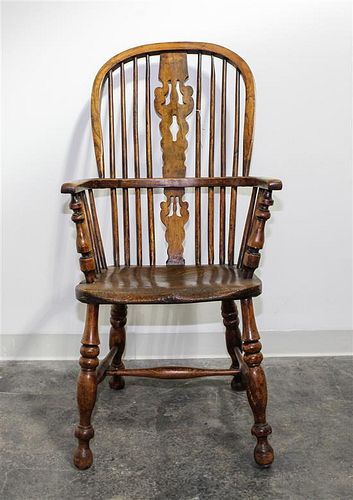 An English Windsor Arm Chair Height 42 1/2 inches.