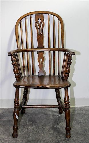 An English Windsor Arm Chair Height 41 1/2 inches.