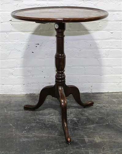An American Mahogany Tea Table Height 27 1/2 inches.