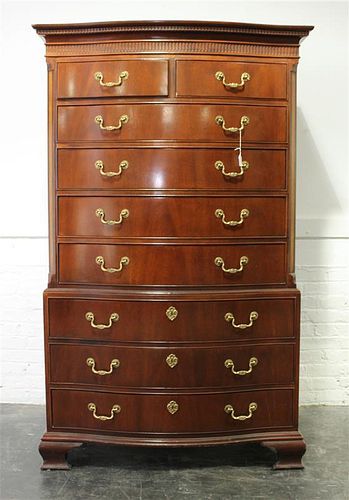 A Chippendale Style Mahogany Chest on Chest Height 69 1/4 x width 42 1/2 x depth 19 inches.