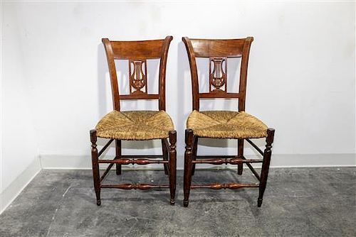 * A Pair of American Walnut Side Chairs Height 33 1/2 inches.