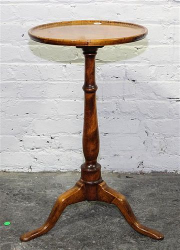 * An American Maple Tripod Table Height 24 1/4 x diameter 14 1/2 inches.