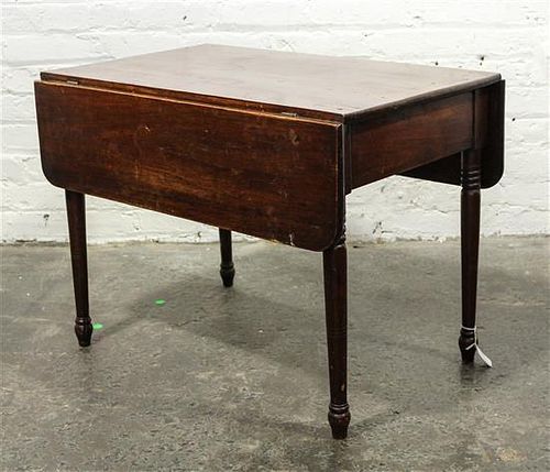 * An American Walnut Drop Leaf Table Height 20 x width 32 1/2 x depth 28 inches (open).