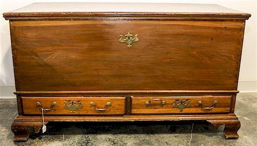* An American Walnut Blanket Chest Height 28 1/4 x width 50 x depth 22 1/4 inches.
