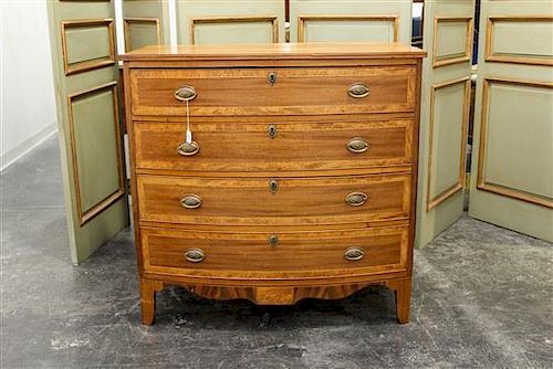 * An American Mahogany Chest of Drawers Height 38 1/4 x width 39 1/2 x depth 21 3/4 inches.