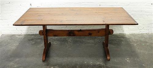 * An American Maple Trestle Table Height 27 3/4 x length 72 1/4 x depth 37 1/2 inches.