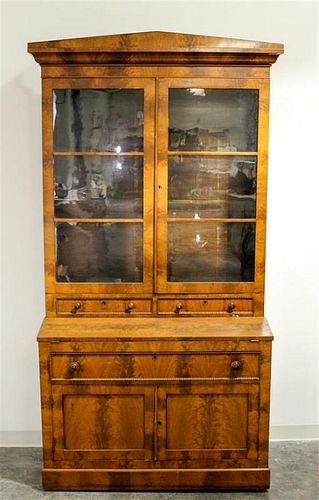 An American Empire Secretary Bookcase Height 90 1/2 x width 41 1/2 x depth 22 inches.