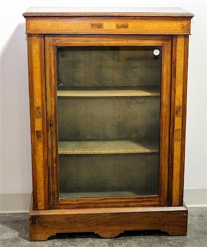 A Walnut Display Cabinet Height 39 x width 28 x depth 11 inches.