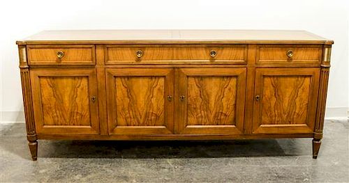 * Baker Furniture, AMERICAN, SECOND HALF 20TH CENTURY, a credenza with four drawers above four cabinet doors
