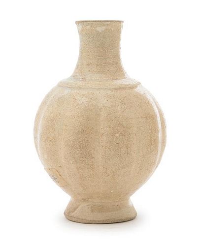 A Small White Glazed Stoneware Vase Height 4 1/2 inches.