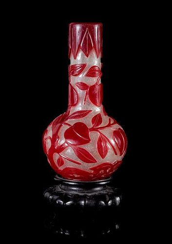 * A Red Overlay Snowflake Ground Peking Glass Vase Height 6 3/4 inches.