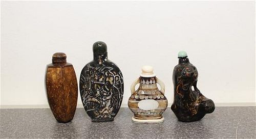 Four Carved Snuff Bottles Height of tallest 3 1/2 inches.