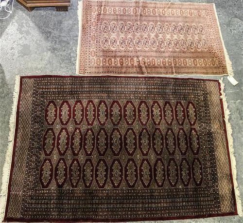 Two Bokhara Wool Rugs Larger: 6 feet 7 inches x 4 feet 5 inches.