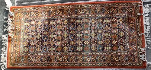 A Northwest Persian Wool Rug 62 3/4 x 30 1/2 inches.
