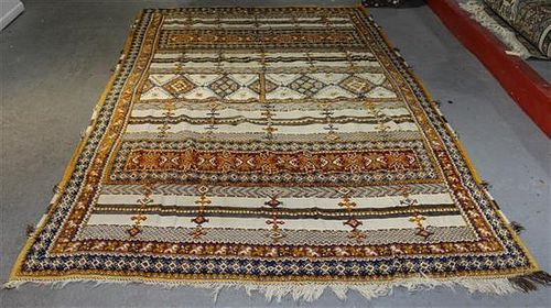 A Moroccan Wool Rug 8 feet 10 inches x 6 feet 8 inches.