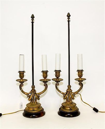 A Pair of Louis XVI Style Gilt Bronze Two-Light Candelabra Mounted as Lamps. Height 24 inches.