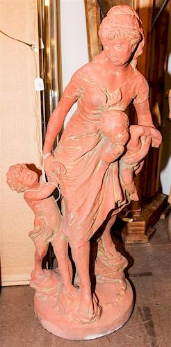 A Terra Cotta Statue of a Mother and Child. Height 36 inches.