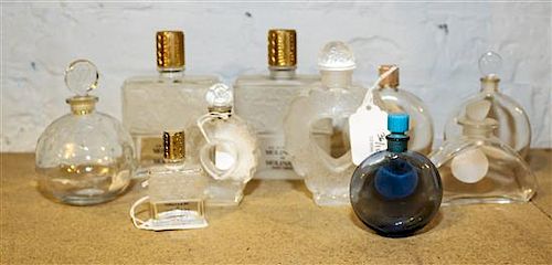 * A Collection of Ten Lalique Glass Perfume Bottles. Height of tallest 4 7/8 inches.