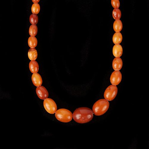 Amber Oval Bead Necklace 22" long, 20.5 grams