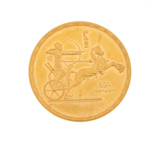 Moneda Egipto en oro amarillo de 21k. Peso: 42.6 g.