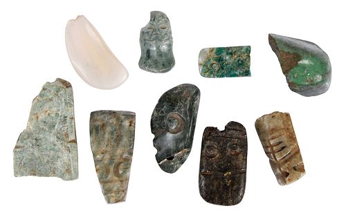 Nine Mesoamerican Carved Jade or Hardstone Fragments and Pendants