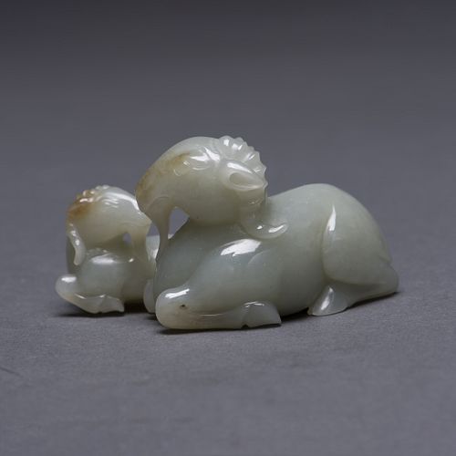A CARVED JADE GOAT MOTHER AND SON