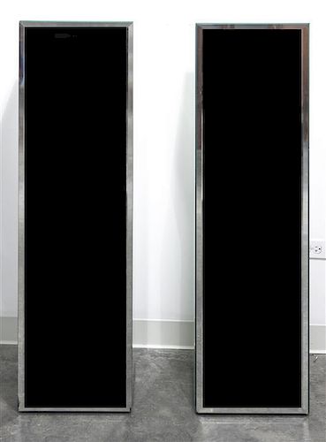 A Pair of Mirrored Pedestals, Height 48 1/4 inches.