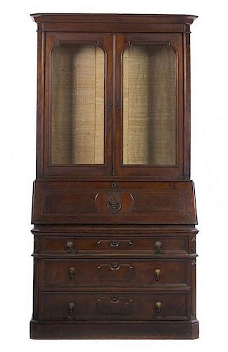 A Victorian Walnut Secretaire Bookcase, Height 90 x width 46 1/4 x depth 22 1/2 inches.